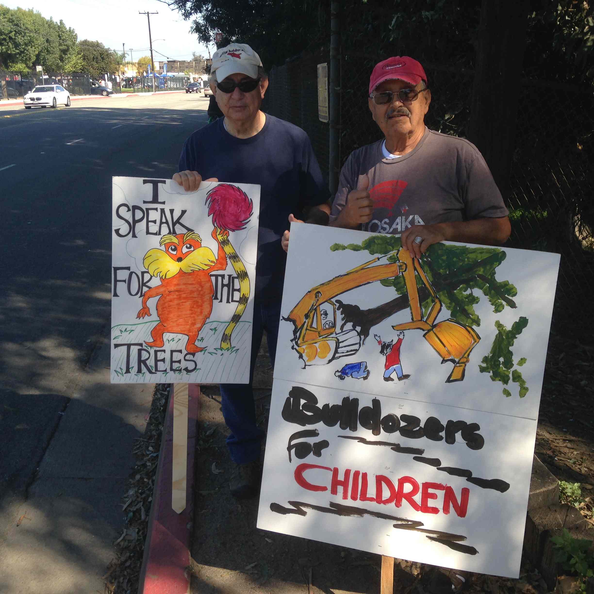 Protest sign reading Bulldozers for Children at Whittier Narrows