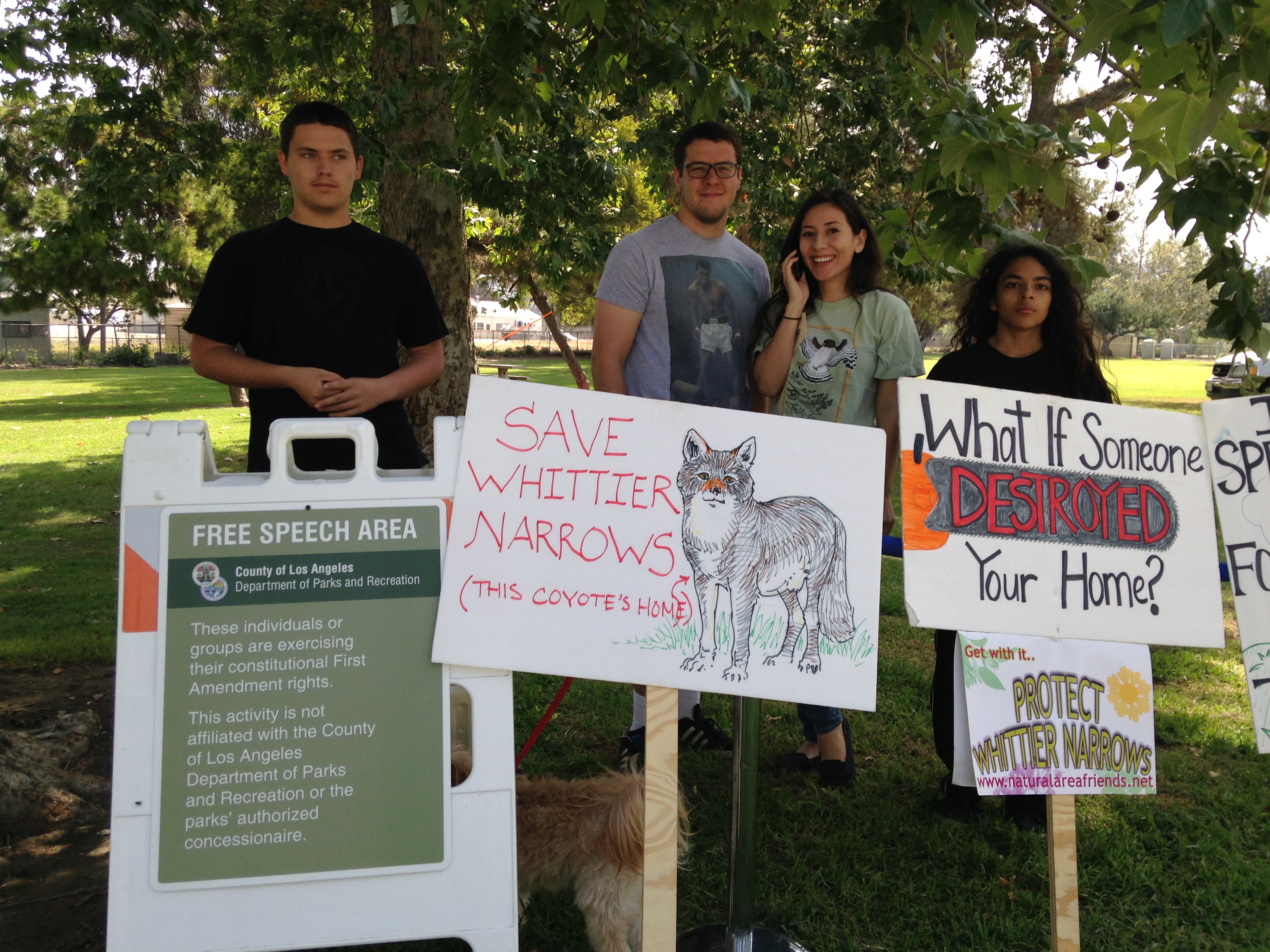 Protesters confronting a county supervisor about Whittier Narrows development